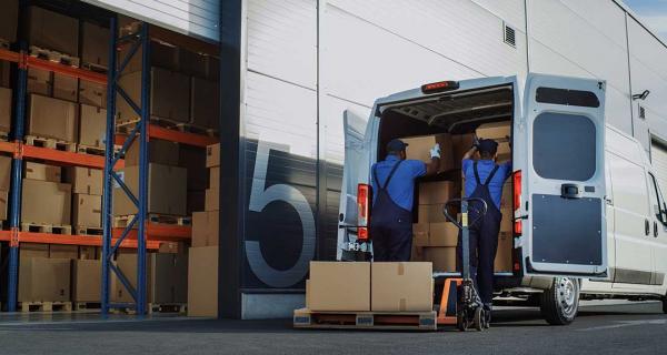 Men offloading a logistics truck
